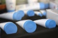 White tubes on counter. Royalty Free Stock Photo