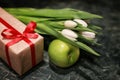 White tulip gift box green background Royalty Free Stock Photo