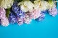 White tulips, pink and blue hyacinths. Garden spring flowers. Top view Royalty Free Stock Photo