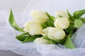 White tulips on a white light cloth. Wedding concept. Love. Royalty Free Stock Photo