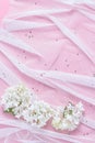 White tulle and beautiful hydrangea flowers. pink table background. feminine wedding, birthday floral concept. flat lay, copy Royalty Free Stock Photo