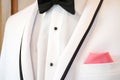 White tuxedo with bow tie