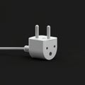 White two-prong electrical plug with a round body and two holes on one side, set again Royalty Free Stock Photo