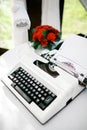 White typewriter at wedding for newlyweds messages and wishes. Wedding decoration.