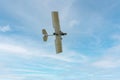 White ultralight aircraft flying in sky, bottom view Royalty Free Stock Photo