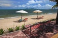 White umbrella and colorful chair is relax vacation.