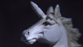 Macro image of a unicorn on a black background Royalty Free Stock Photo