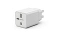 White universal power adapter with three rectangular prongs and a slot for Royalty Free Stock Photo