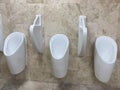 White urinals ceramic men public toilet Royalty Free Stock Photo