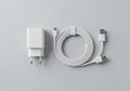 White USB charging set on a light gray background. Includes a Royalty Free Stock Photo