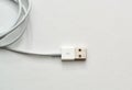 White USB connector on a completely white background