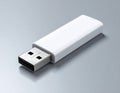 White USB flash drive with metallic connector on a textured gray studio background storage Royalty Free Stock Photo