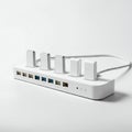 White USB hub featuring multiple ports, including USB and Ethernet, with a sleek modern Royalty Free Stock Photo