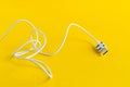 USB Micro cable isolated on yellow background