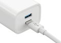White usb power adapter connected with charging cable Royalty Free Stock Photo