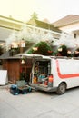 White van with diverse tools installing Christmas MArket