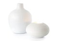 White vase and candle holder