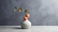 Whimsical Minimalism: White Vase Of Oranges On Grey Wall