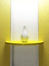 A white vase is standing on the yellow shelf,