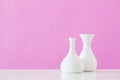 the white vases on pink background Royalty Free Stock Photo