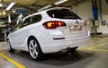 A white Vauxhall Astra Sports Tourer coming off the production line at the Vauxhall car factory Ellesmere port Cheshire July 2011