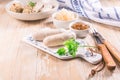 White veal sausage Weisswurst with pickled white sour cabbage Sauerkraut and bread dumplings Knodel