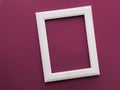 White vertical art frame on purple background as flatlay design, artwork print or photo album