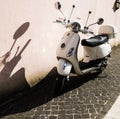 White Vespa scooter
