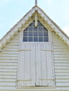 White Victorian house gable, window, and doors Royalty Free Stock Photo
