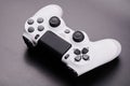 White video game controller, joystick for game console isolated on black background Royalty Free Stock Photo