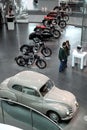 White vintage Audi car and motocycles