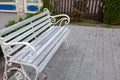 white vintage bench in the park, rest in the park Royalty Free Stock Photo