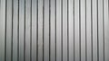 White vintage corrugated metal or zinc texture surface or galvanize steel in the vertical line background or texture