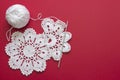 White vintage crochet doily. Cotton yarn for knitting, crochet hook