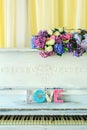 White vintage pianino with Love latters Royalty Free Stock Photo