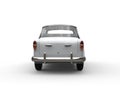 White vintage small compact car - back view Royalty Free Stock Photo