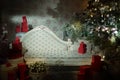 white vintage sofa for background wall with wallpaper and furnished with boxes of gifts and a Christmas tree decorated