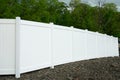 White vinyl fence fencing of private property