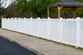 White vinyl fence fencing of private property