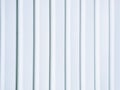 White vinyl wood siding panel background with imitation wood texture Royalty Free Stock Photo