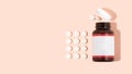 White vitamins in pills and glass bottle on a rose pink background. Few tablets. Healthy immunity concept composition. Wellness, Royalty Free Stock Photo