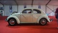 White Volkswagen Beetle on display at Jogja VW Festival side view Royalty Free Stock Photo