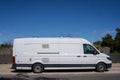 A White Volkswagen Crafter Van Parked on the Side of the Road