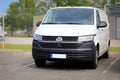 White Volkswagen Multivan T6 Parked on a Yard