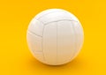White volleyball isolated on a yellow background Royalty Free Stock Photo