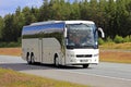 White Volvo Bus on Summer Freeway