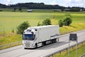 White Volvo FH Truck Refrigerated Semi Trailer on Motorway