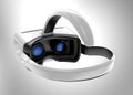 White VR headset isolated on gray background. Royalty Free Stock Photo