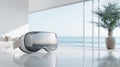 White VR headset on a table overlooking ocean view. A modern technology concept Royalty Free Stock Photo
