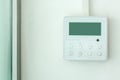 White wall air conditioning control panel. Royalty Free Stock Photo